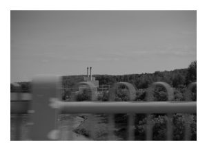 A view of the defunct diesel power plant while traveling west across the Fort Street Bridge in Caribou, Maine.