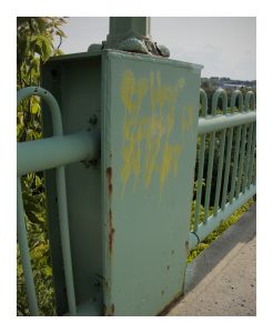 The base of one of the lamp posts on the Fort Street Bridge in Caribou, Maine.