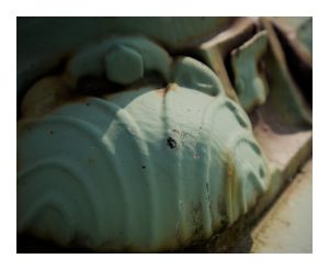 The base of one of the lamp posts on the Fort Street Bridge in Caribou, Maine.