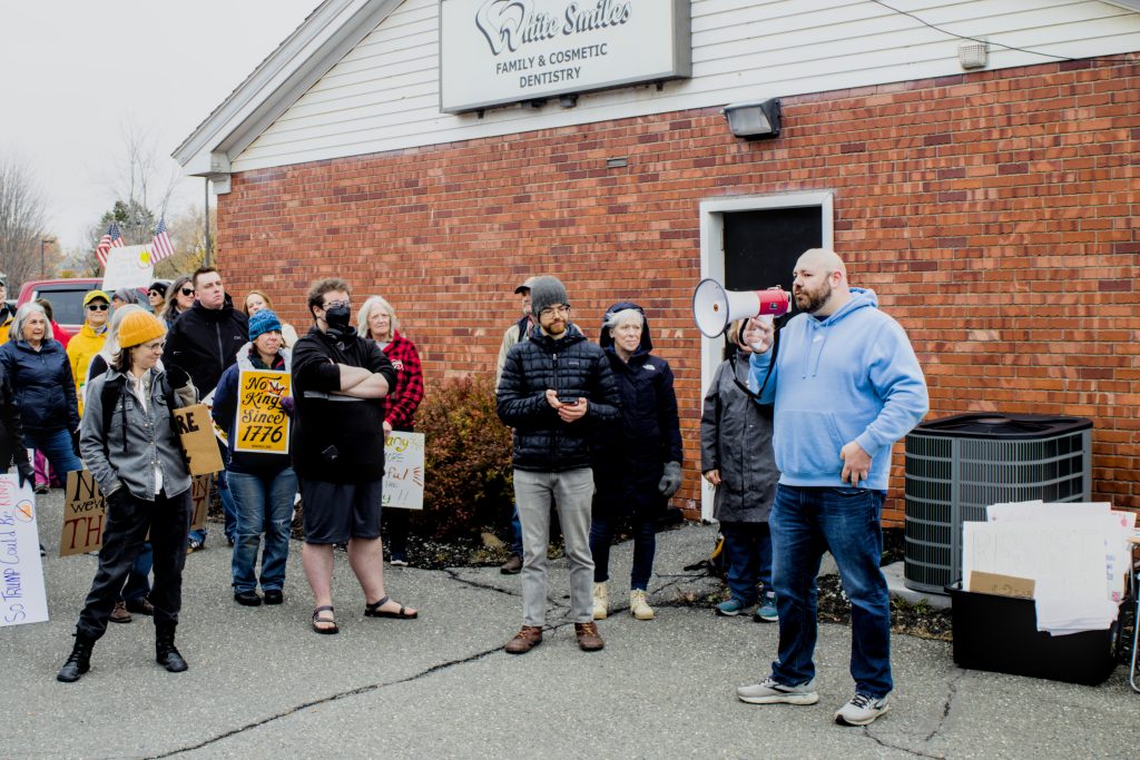 Local city council candidate Harold Hull speaks to the crowd during the No Kings protest in Presque Isle, Maine, on October 18th, 2025.
