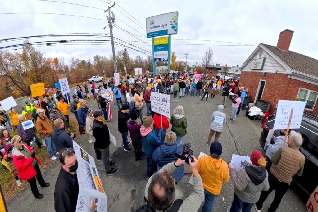 A large crowd gathers to hear the features speakers of the No Kings protest in Presque Isle, Maine, on October 18th, 2025.